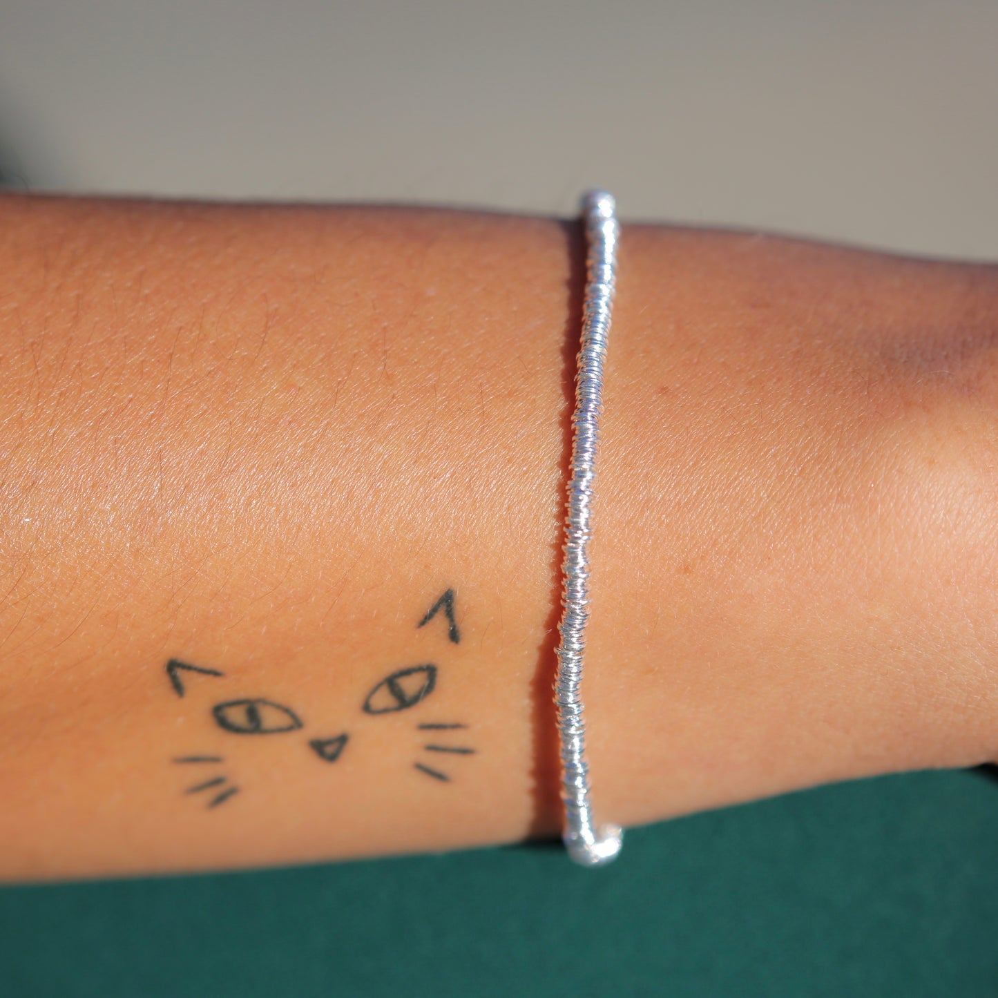 Pulsera mostacillas plata