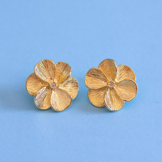 Aros flor punto de luz gold