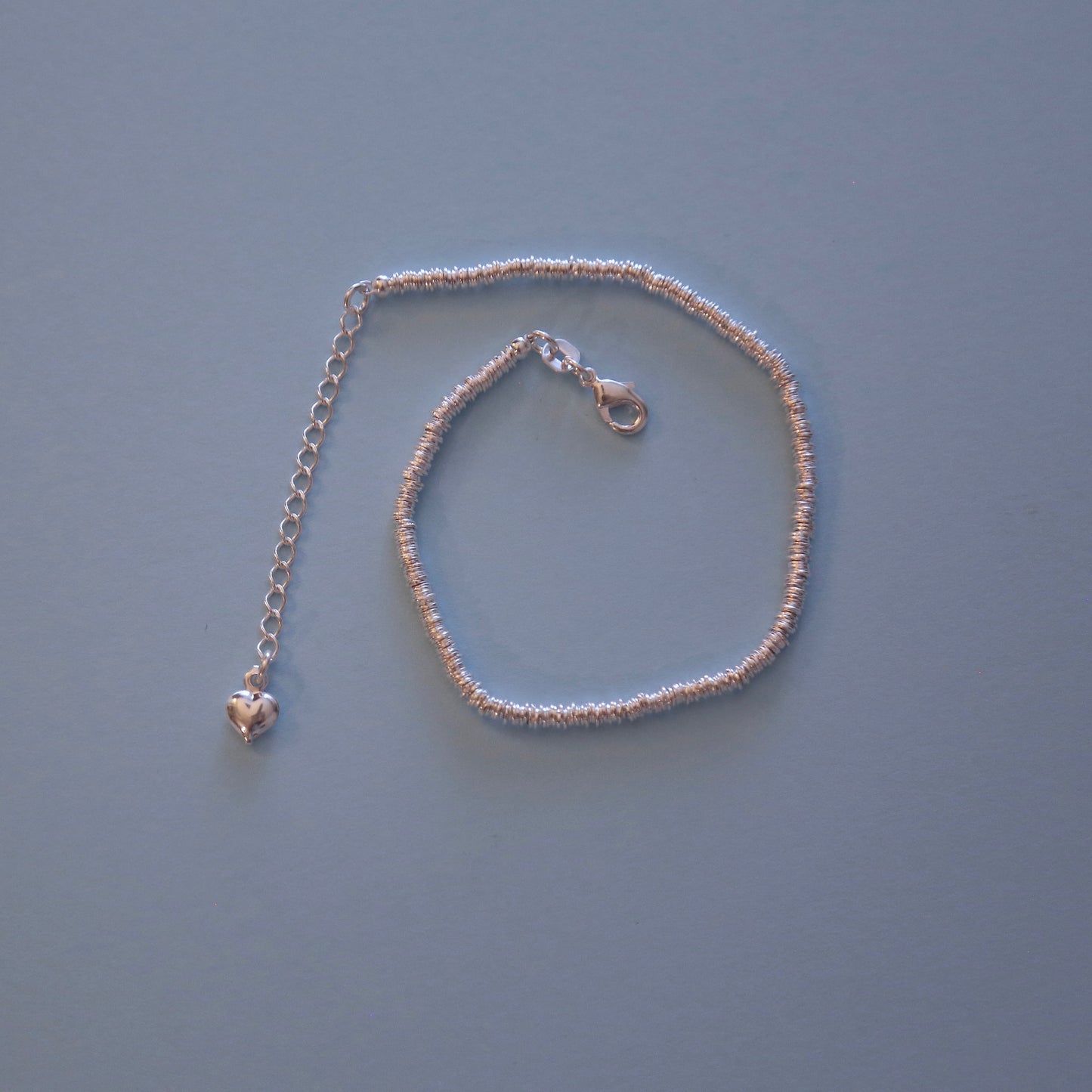 Pulsera mostacillas plata