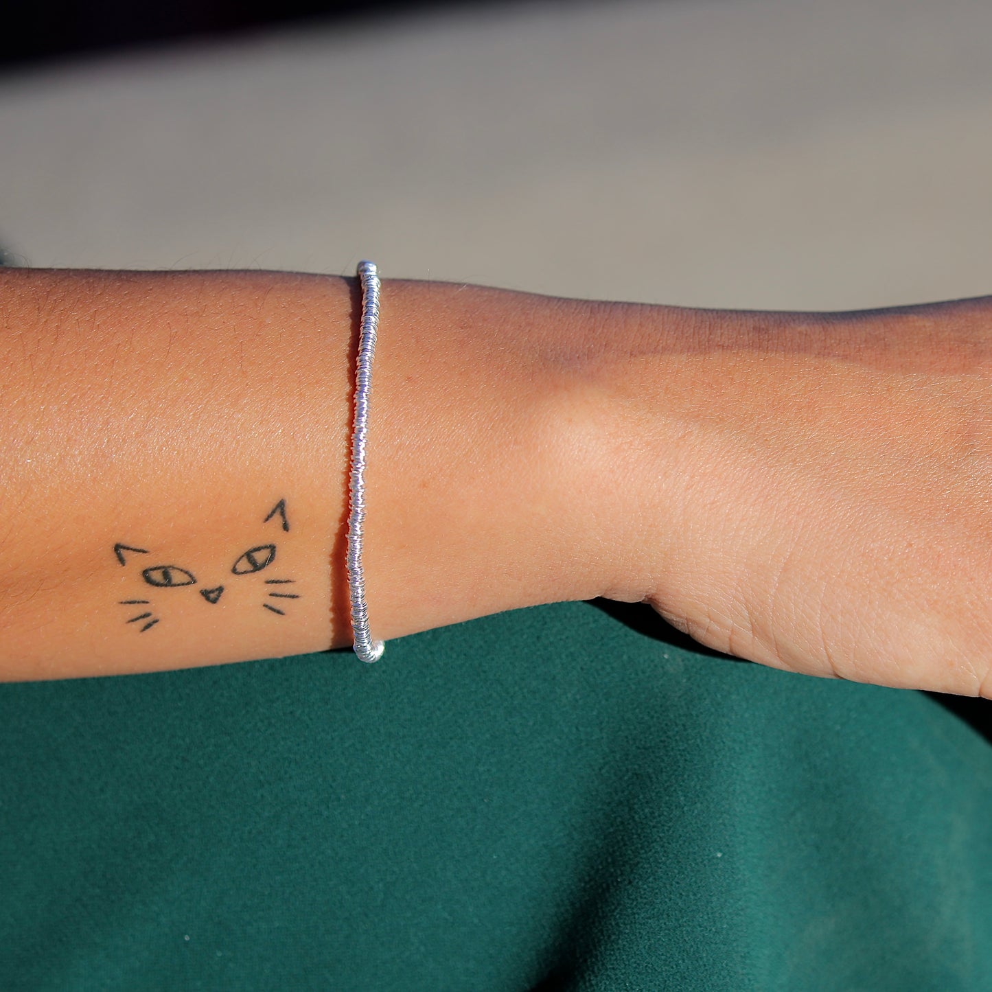 Pulsera mostacillas plata